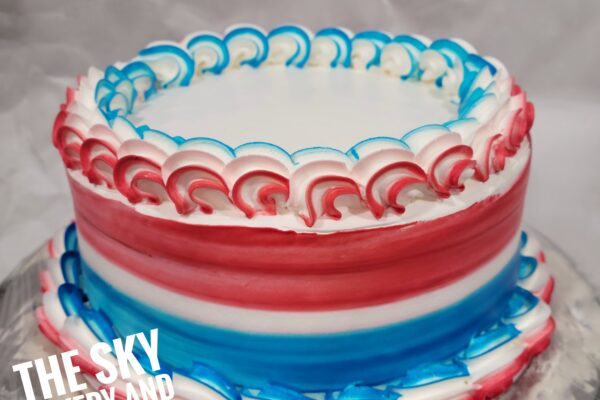 C004 - Small blue and red colorful cake top white